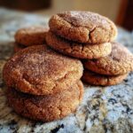 Close-up of a stack of delicious Gingerdoodle Cookies, coated in cinnamon sugar.