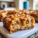 Close-up of a Salted Caramel Pretzel Blondie slice with caramel drizzle.